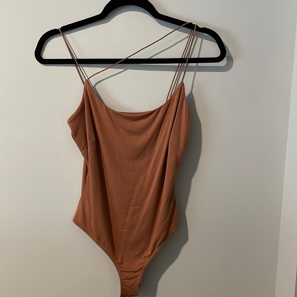 Large body suit never been used